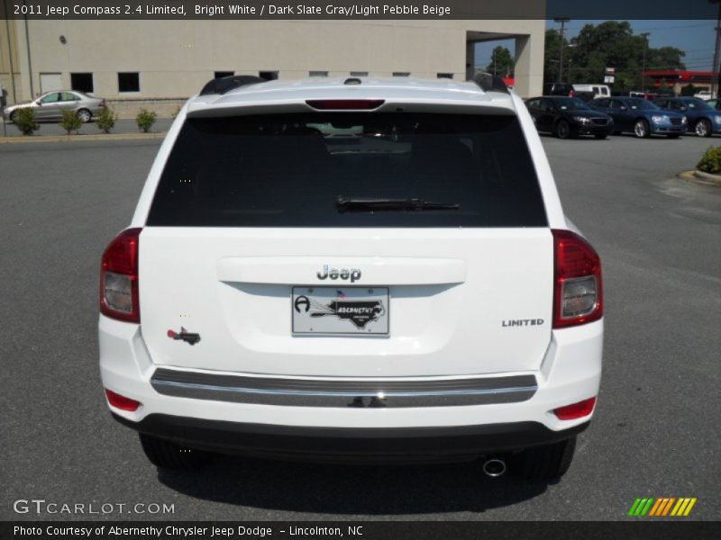 Bright White / Dark Slate Gray/Light Pebble Beige 2011 Jeep Compass 2.4 Limited