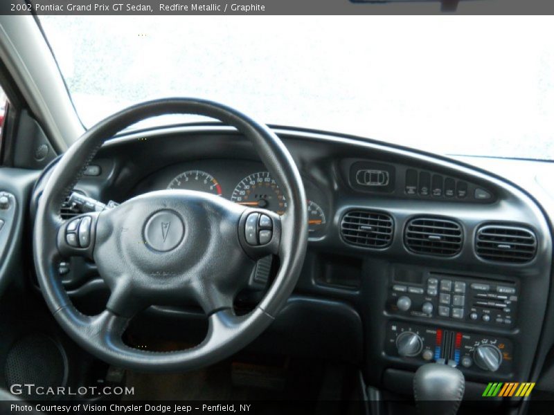 Redfire Metallic / Graphite 2002 Pontiac Grand Prix GT Sedan