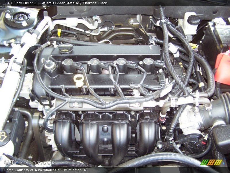 Atlantis Green Metallic / Charcoal Black 2010 Ford Fusion SE