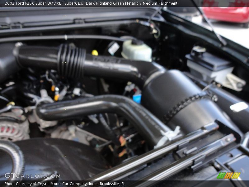 Dark Highland Green Metallic / Medium Parchment 2002 Ford F250 Super Duty XLT SuperCab