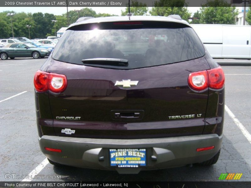 Dark Cherry Metallic / Ebony 2009 Chevrolet Traverse LT AWD
