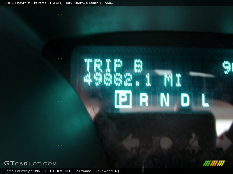 Dark Cherry Metallic / Ebony 2009 Chevrolet Traverse LT AWD