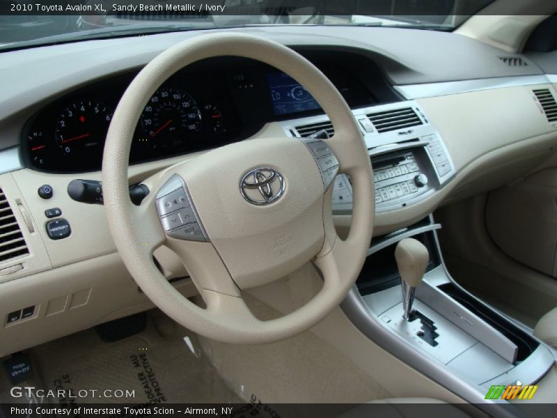 Sandy Beach Metallic / Ivory 2010 Toyota Avalon XL