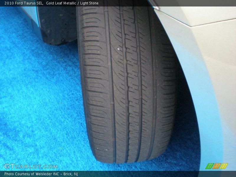 Gold Leaf Metallic / Light Stone 2010 Ford Taurus SEL