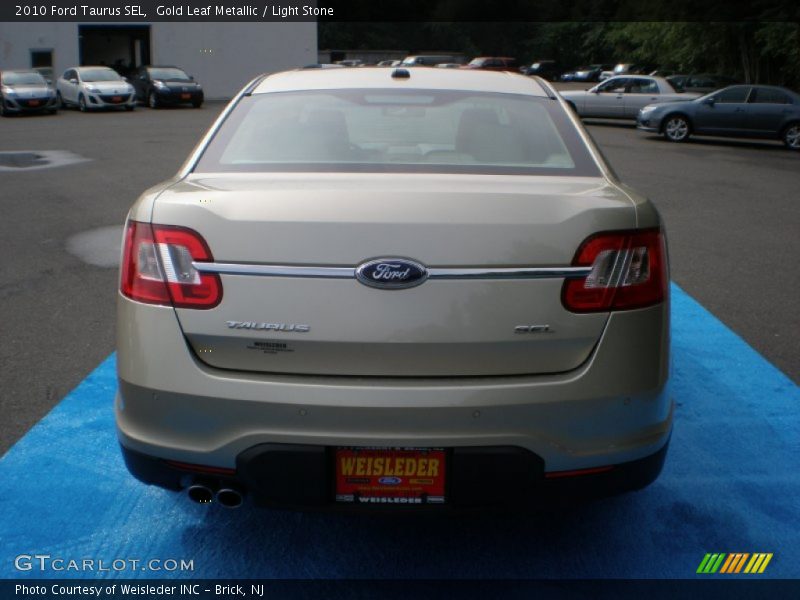 Gold Leaf Metallic / Light Stone 2010 Ford Taurus SEL