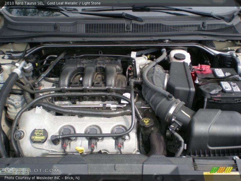 Gold Leaf Metallic / Light Stone 2010 Ford Taurus SEL