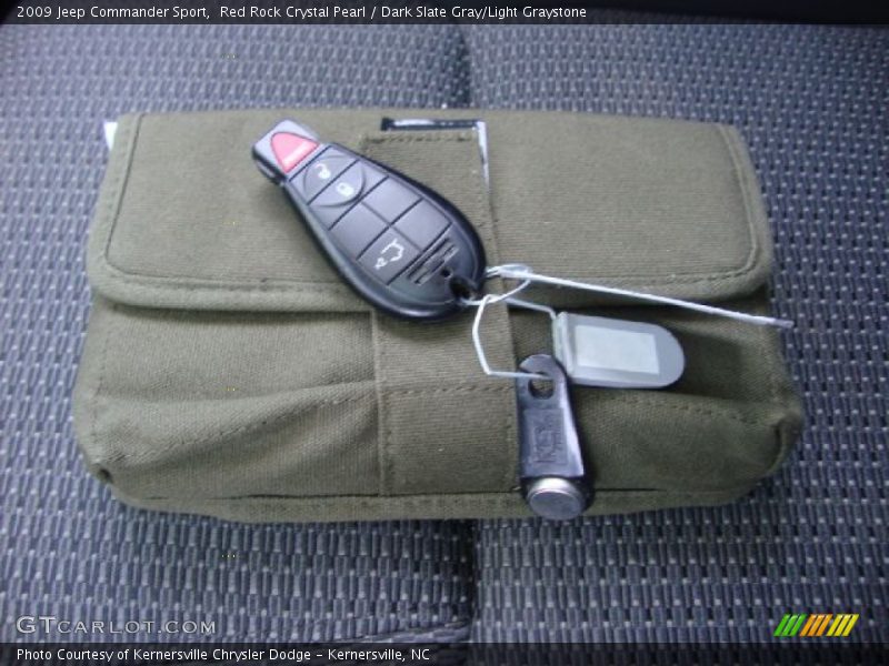 Red Rock Crystal Pearl / Dark Slate Gray/Light Graystone 2009 Jeep Commander Sport