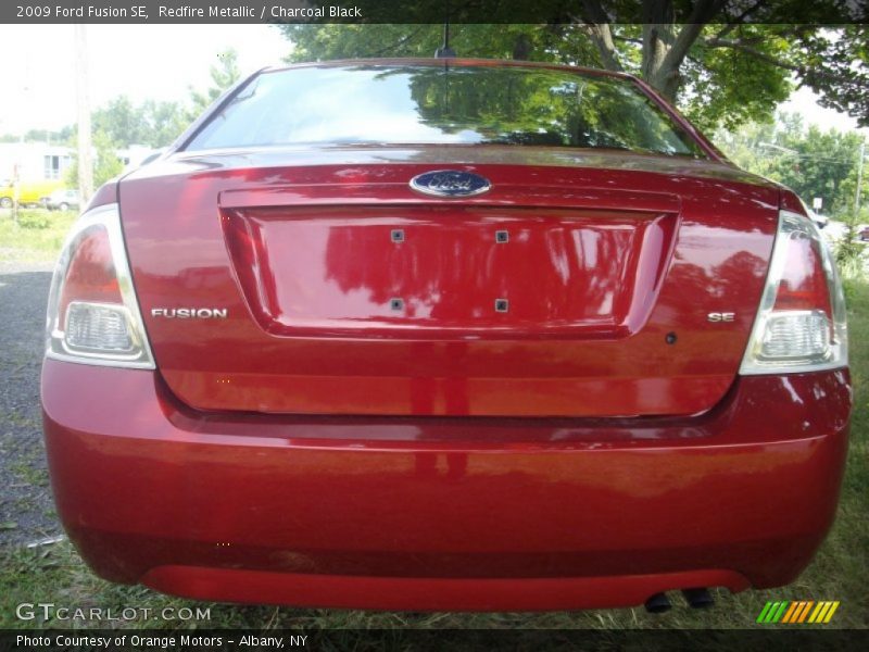 Redfire Metallic / Charcoal Black 2009 Ford Fusion SE