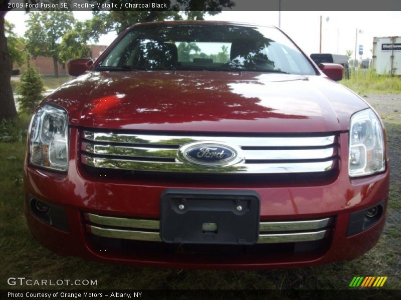 Redfire Metallic / Charcoal Black 2009 Ford Fusion SE