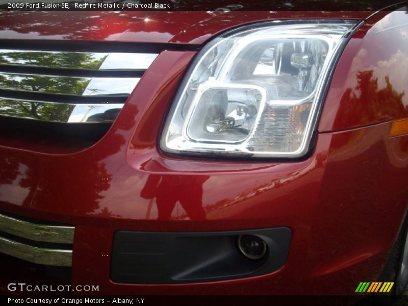Redfire Metallic / Charcoal Black 2009 Ford Fusion SE