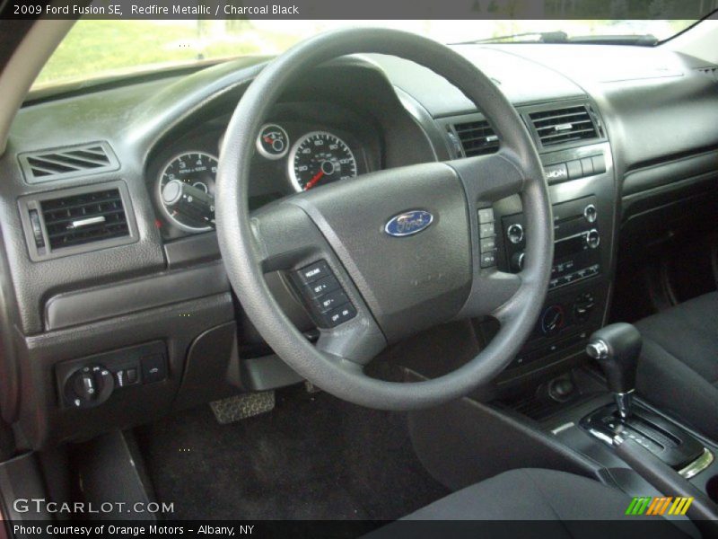 Redfire Metallic / Charcoal Black 2009 Ford Fusion SE