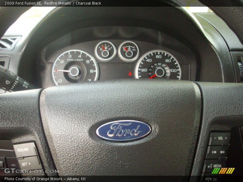 Redfire Metallic / Charcoal Black 2009 Ford Fusion SE