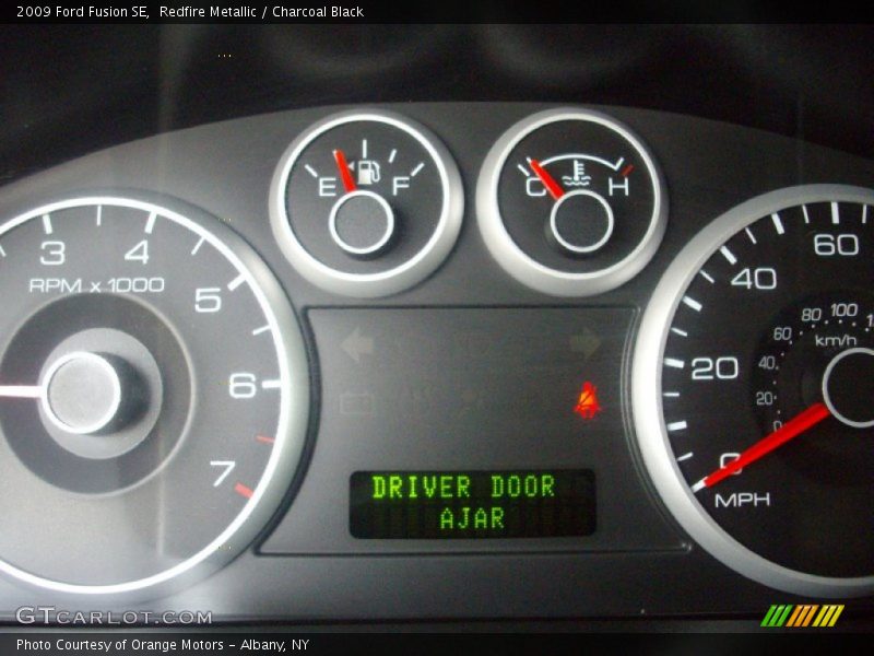 Redfire Metallic / Charcoal Black 2009 Ford Fusion SE