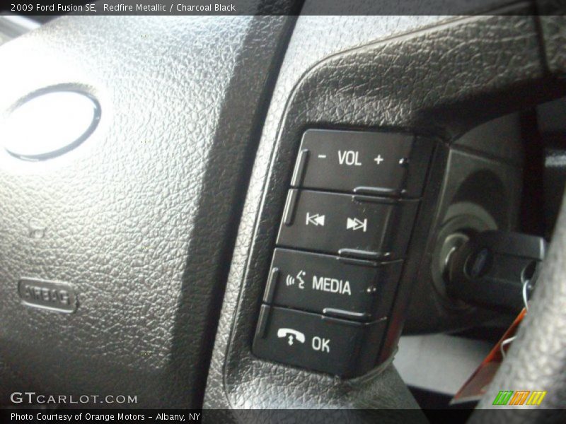 Redfire Metallic / Charcoal Black 2009 Ford Fusion SE