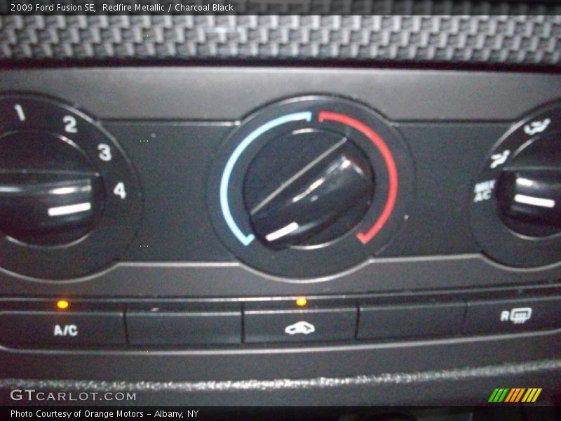 Redfire Metallic / Charcoal Black 2009 Ford Fusion SE