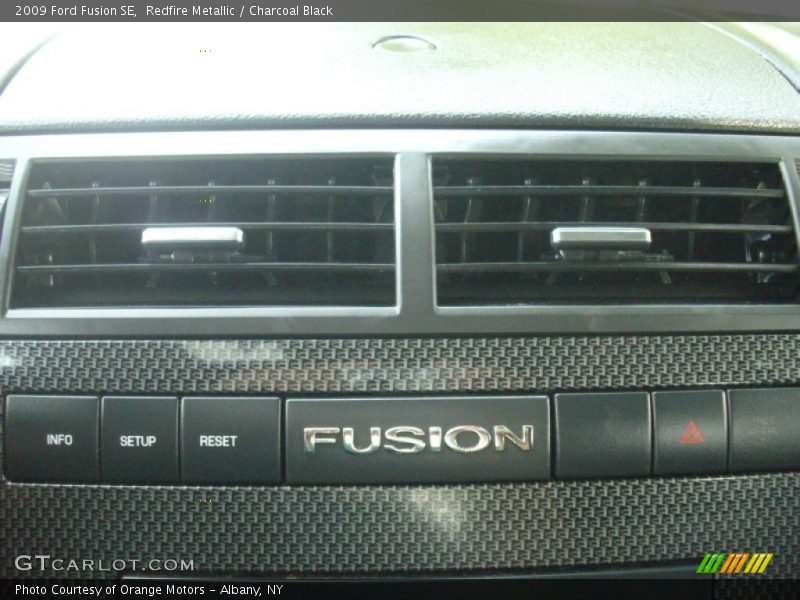 Redfire Metallic / Charcoal Black 2009 Ford Fusion SE