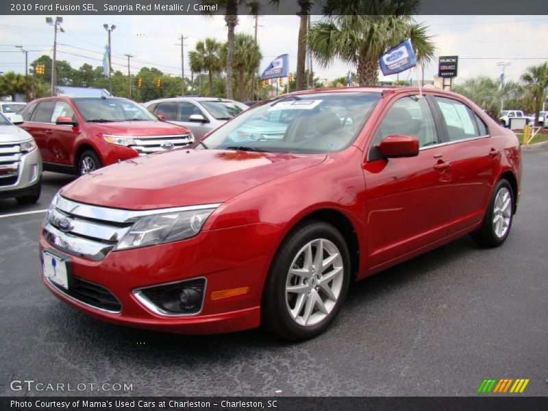 Sangria Red Metallic / Camel 2010 Ford Fusion SEL