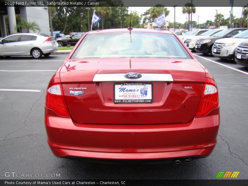 Sangria Red Metallic / Camel 2010 Ford Fusion SEL