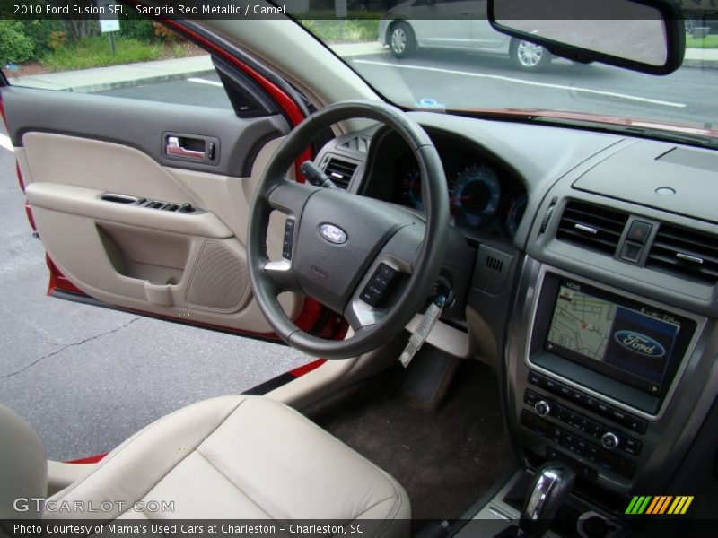 Sangria Red Metallic / Camel 2010 Ford Fusion SEL