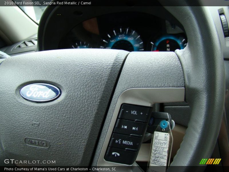 Sangria Red Metallic / Camel 2010 Ford Fusion SEL