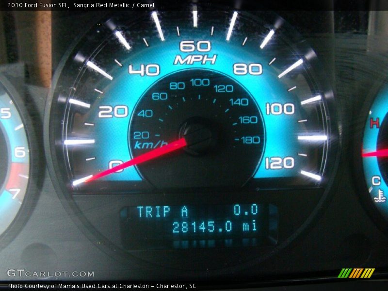 Sangria Red Metallic / Camel 2010 Ford Fusion SEL