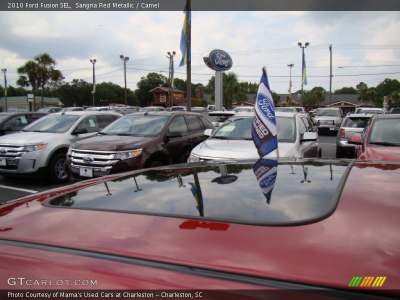 Sangria Red Metallic / Camel 2010 Ford Fusion SEL