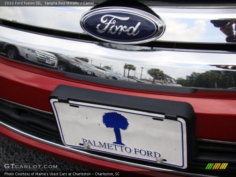 Sangria Red Metallic / Camel 2010 Ford Fusion SEL