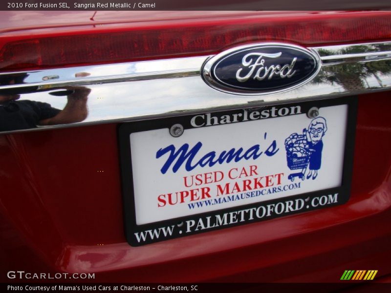 Sangria Red Metallic / Camel 2010 Ford Fusion SEL
