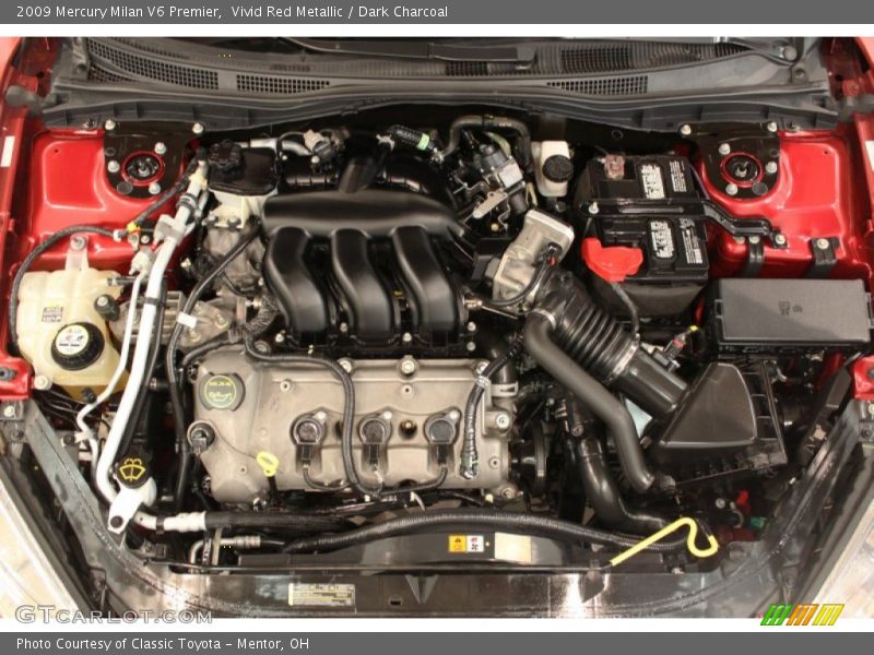 Vivid Red Metallic / Dark Charcoal 2009 Mercury Milan V6 Premier