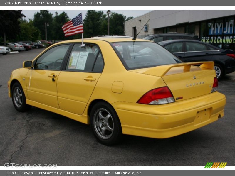 Lightning Yellow / Black 2002 Mitsubishi Lancer OZ Rally