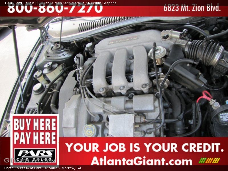 Dark Green Satin Metallic / Medium Graphite 1998 Ford Taurus SE