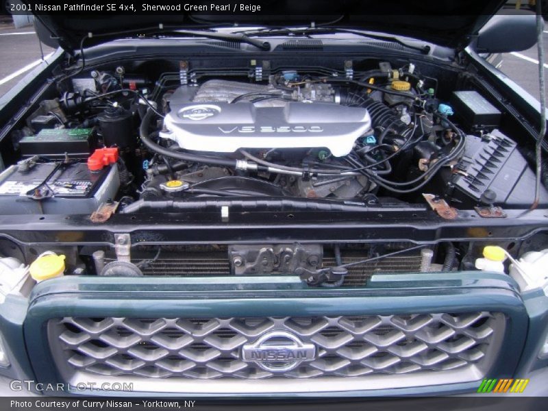 Sherwood Green Pearl / Beige 2001 Nissan Pathfinder SE 4x4