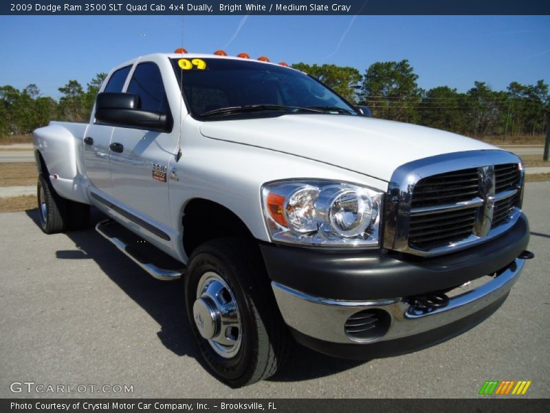 Front 3/4 View of 2009 Ram 3500 SLT Quad Cab 4x4 Dually
