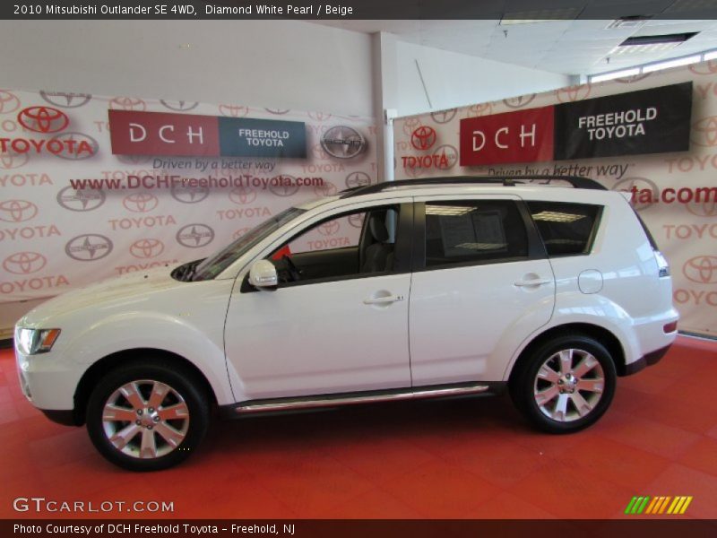 Diamond White Pearl / Beige 2010 Mitsubishi Outlander SE 4WD