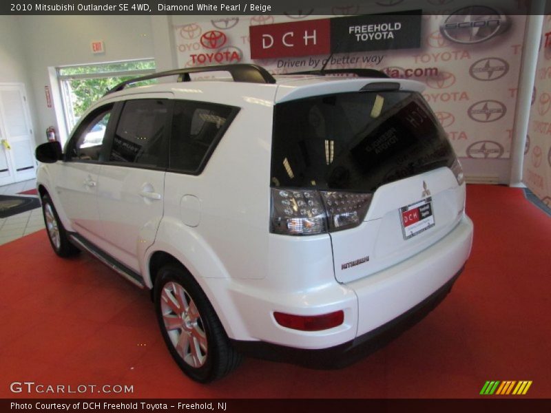 Diamond White Pearl / Beige 2010 Mitsubishi Outlander SE 4WD