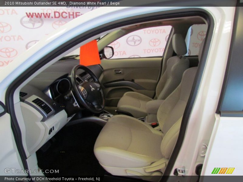 Diamond White Pearl / Beige 2010 Mitsubishi Outlander SE 4WD