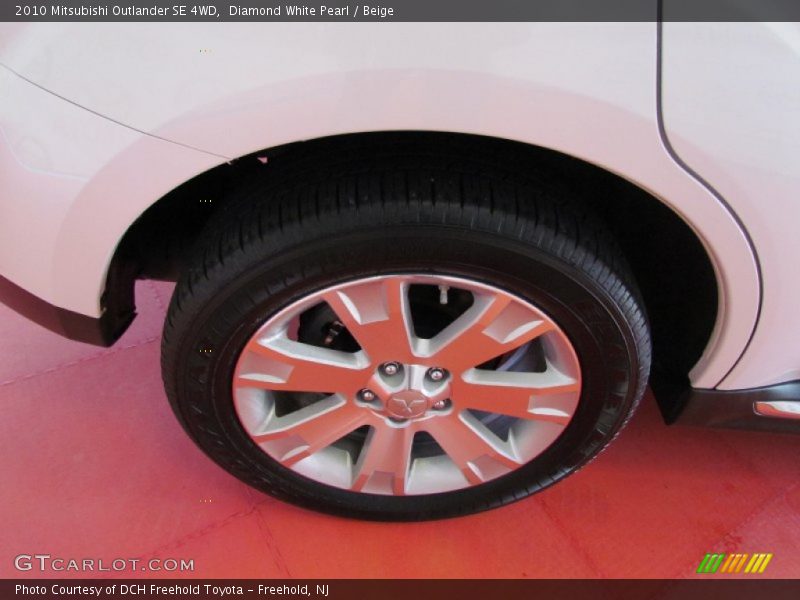 Diamond White Pearl / Beige 2010 Mitsubishi Outlander SE 4WD