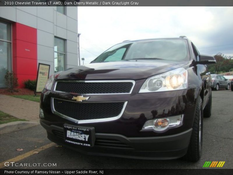 Dark Cherry Metallic / Dark Gray/Light Gray 2010 Chevrolet Traverse LT AWD