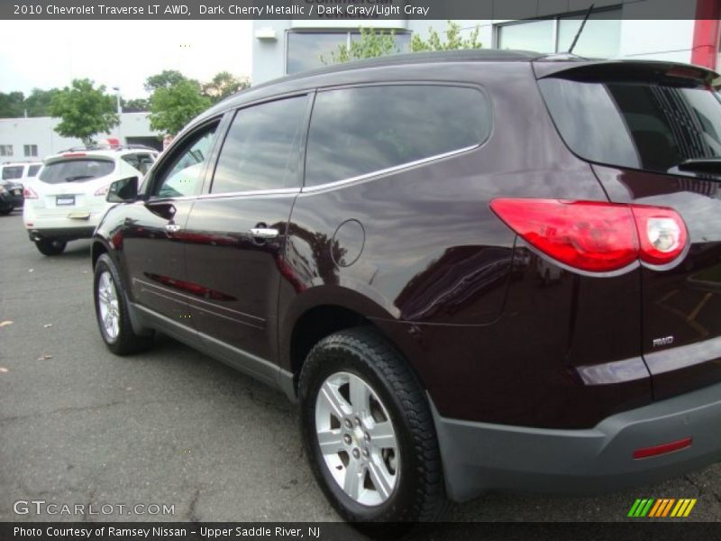 Dark Cherry Metallic / Dark Gray/Light Gray 2010 Chevrolet Traverse LT AWD
