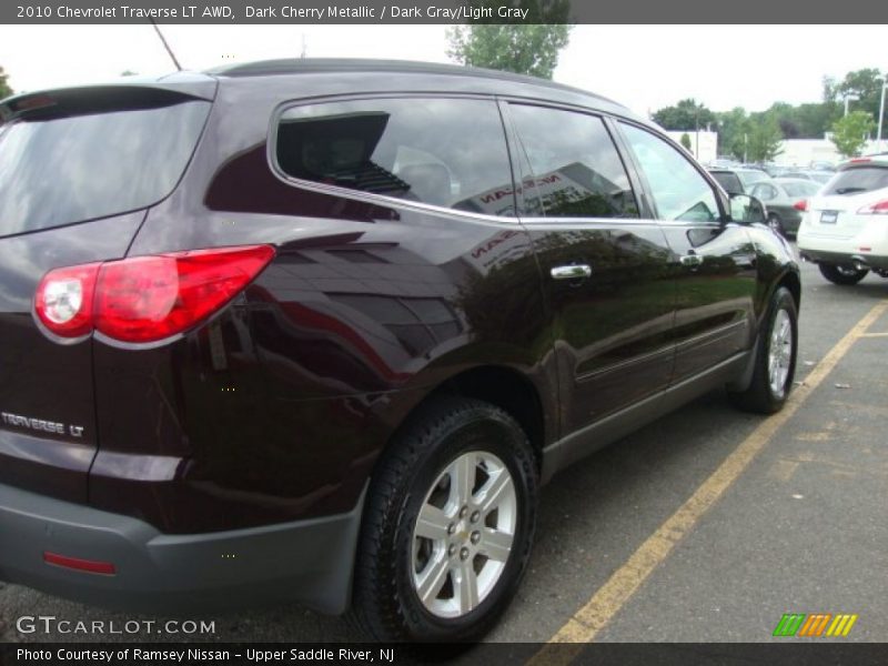 Dark Cherry Metallic / Dark Gray/Light Gray 2010 Chevrolet Traverse LT AWD