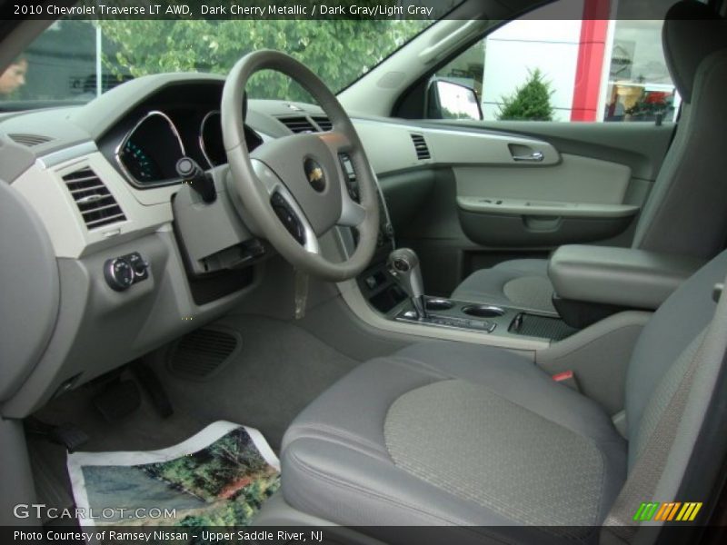 Dark Cherry Metallic / Dark Gray/Light Gray 2010 Chevrolet Traverse LT AWD