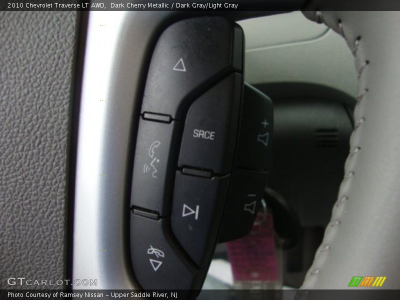 Dark Cherry Metallic / Dark Gray/Light Gray 2010 Chevrolet Traverse LT AWD