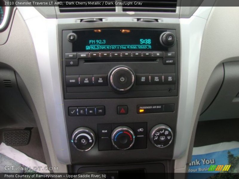 Dark Cherry Metallic / Dark Gray/Light Gray 2010 Chevrolet Traverse LT AWD