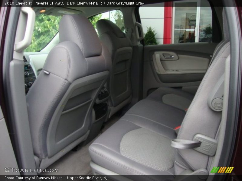 Dark Cherry Metallic / Dark Gray/Light Gray 2010 Chevrolet Traverse LT AWD