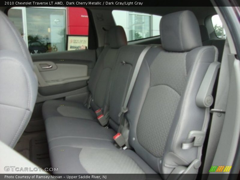 Dark Cherry Metallic / Dark Gray/Light Gray 2010 Chevrolet Traverse LT AWD