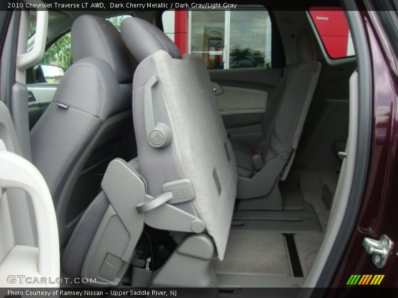 Dark Cherry Metallic / Dark Gray/Light Gray 2010 Chevrolet Traverse LT AWD