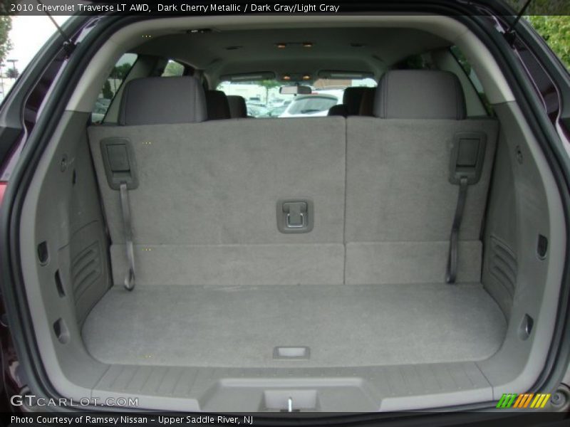 Dark Cherry Metallic / Dark Gray/Light Gray 2010 Chevrolet Traverse LT AWD