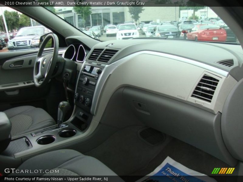 Dark Cherry Metallic / Dark Gray/Light Gray 2010 Chevrolet Traverse LT AWD