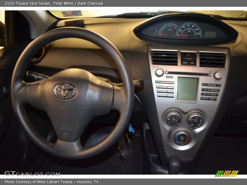 Polar White / Dark Charcoal 2010 Toyota Yaris Sedan