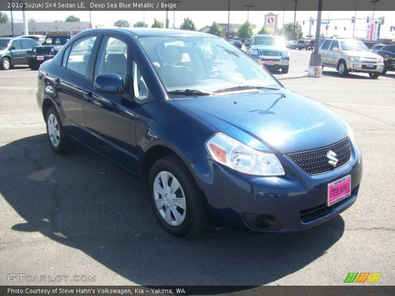 Deep Sea Blue Metallic / Beige 2010 Suzuki SX4 Sedan LE